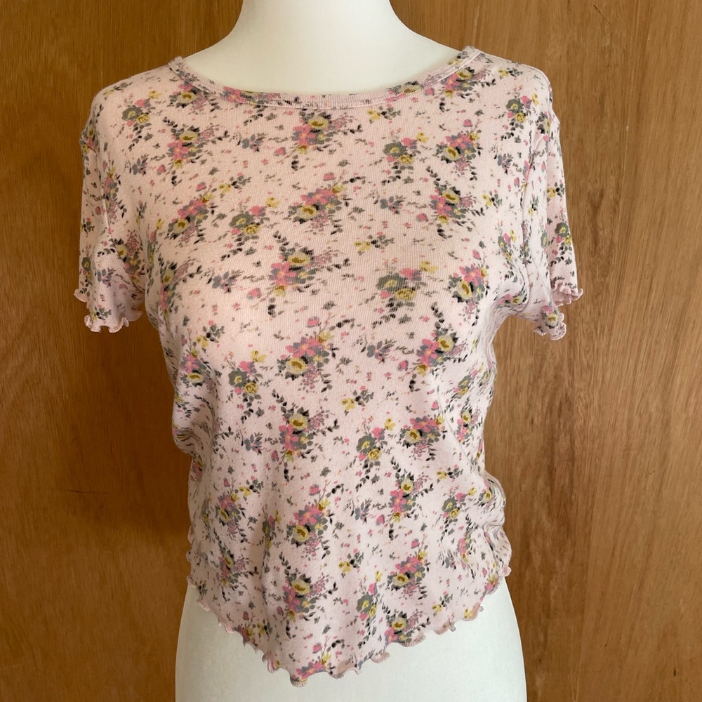 Pink floral top, ruffles at ends of sleeves and bottom of top, size S